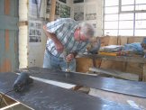 Preparing the steel plates for centreboard lamination